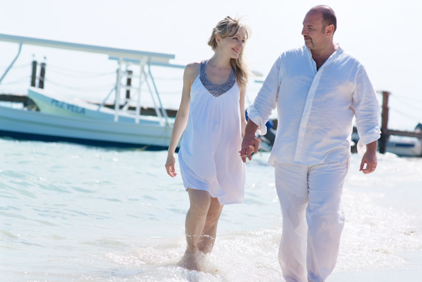 Destination wedding bride and groom walking