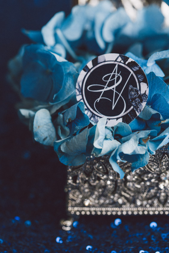 bride and groom logo in blue flowers