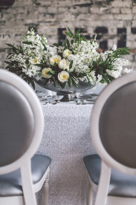 Wedding decor details with grey chairs