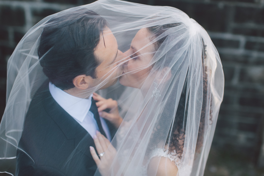 Kissing under brides veil Alexander Muir Park