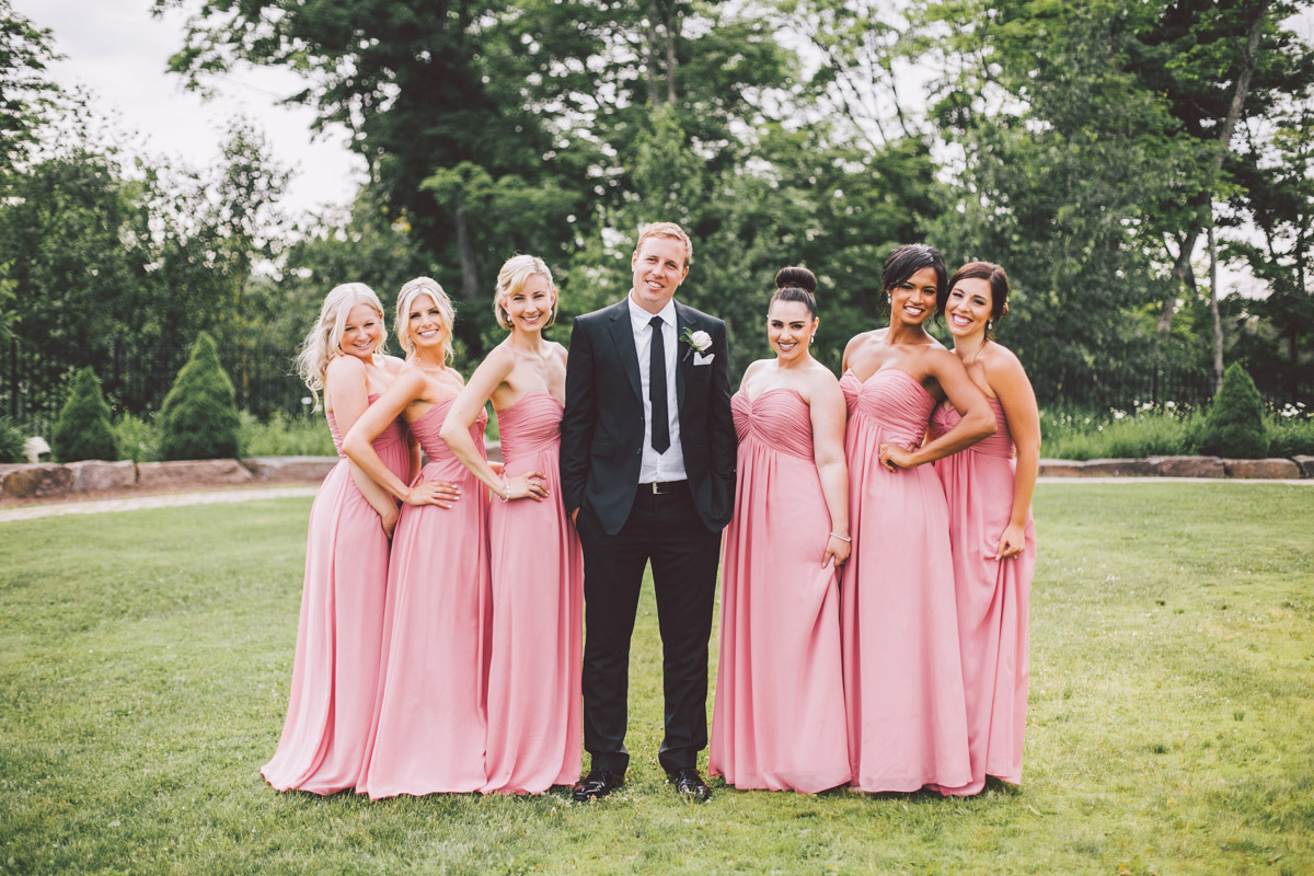 groom with bridesmaids 