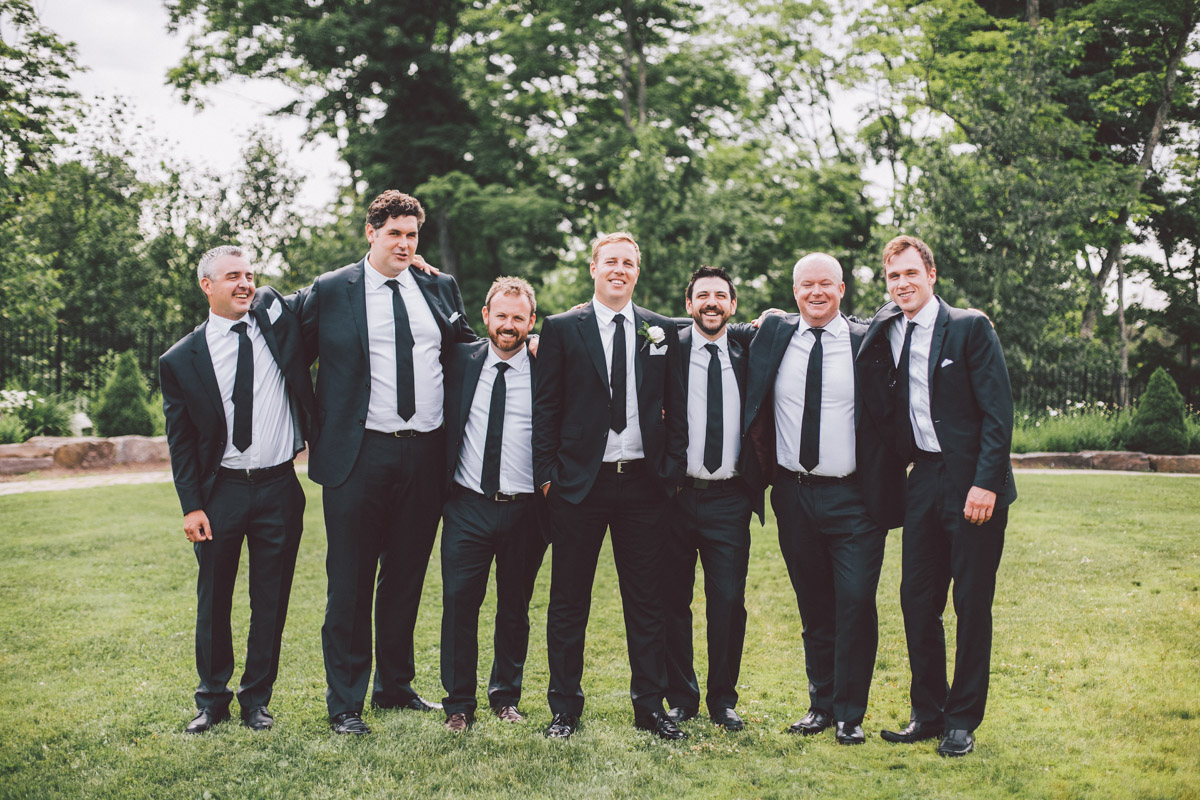 groomsmen posing for pictures