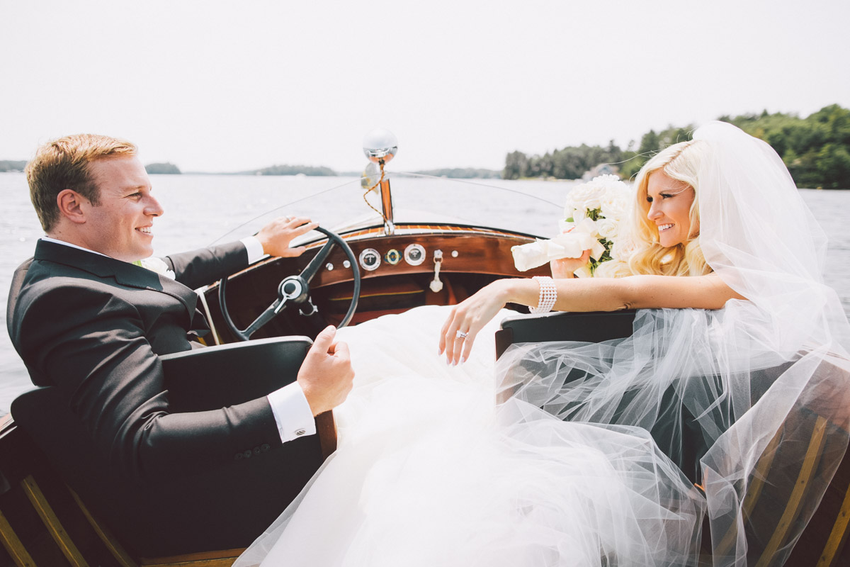 bride and groom on the lake