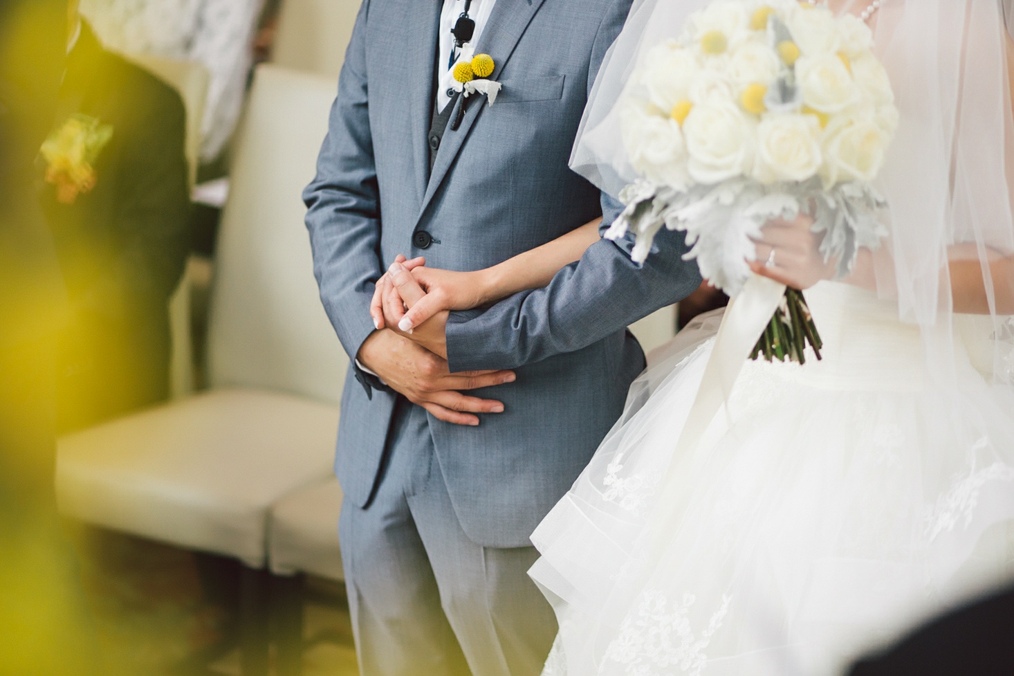 wedding ceremony holding hands
