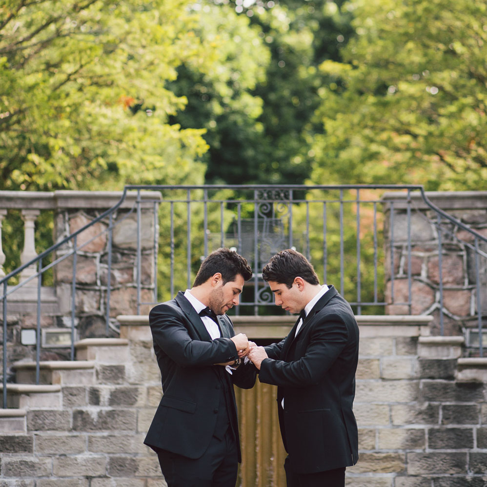 brother helping groom