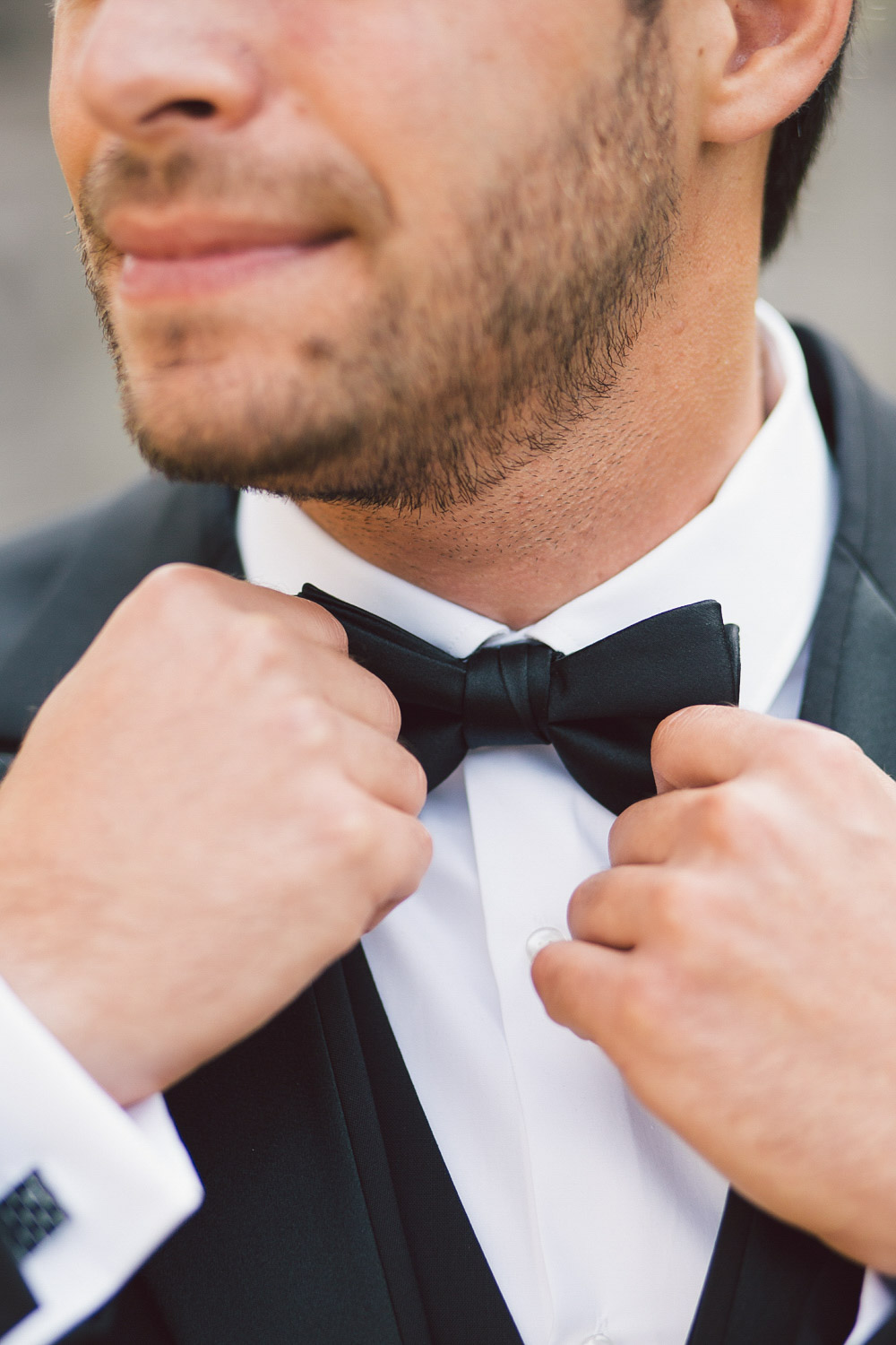 fixing grooms bow tie