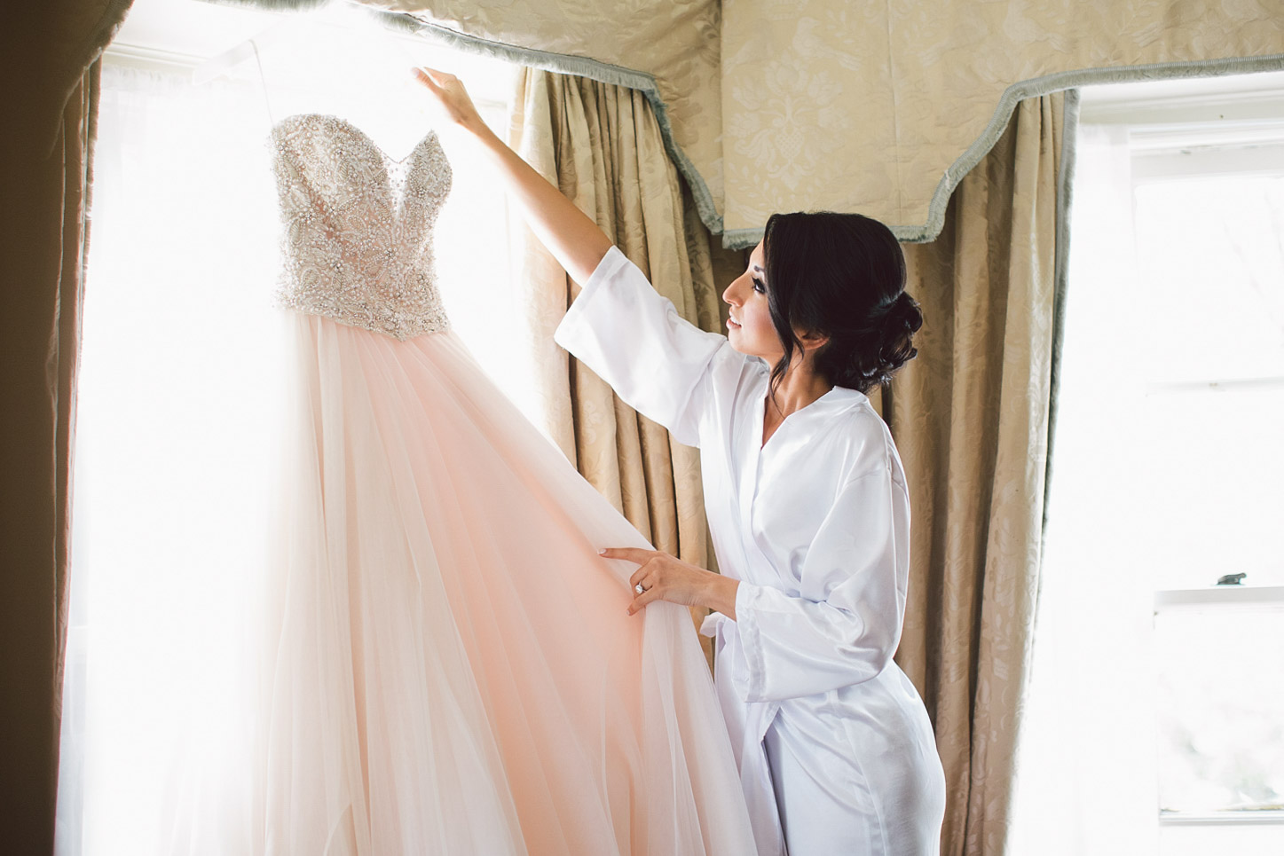 bride getting down the dress