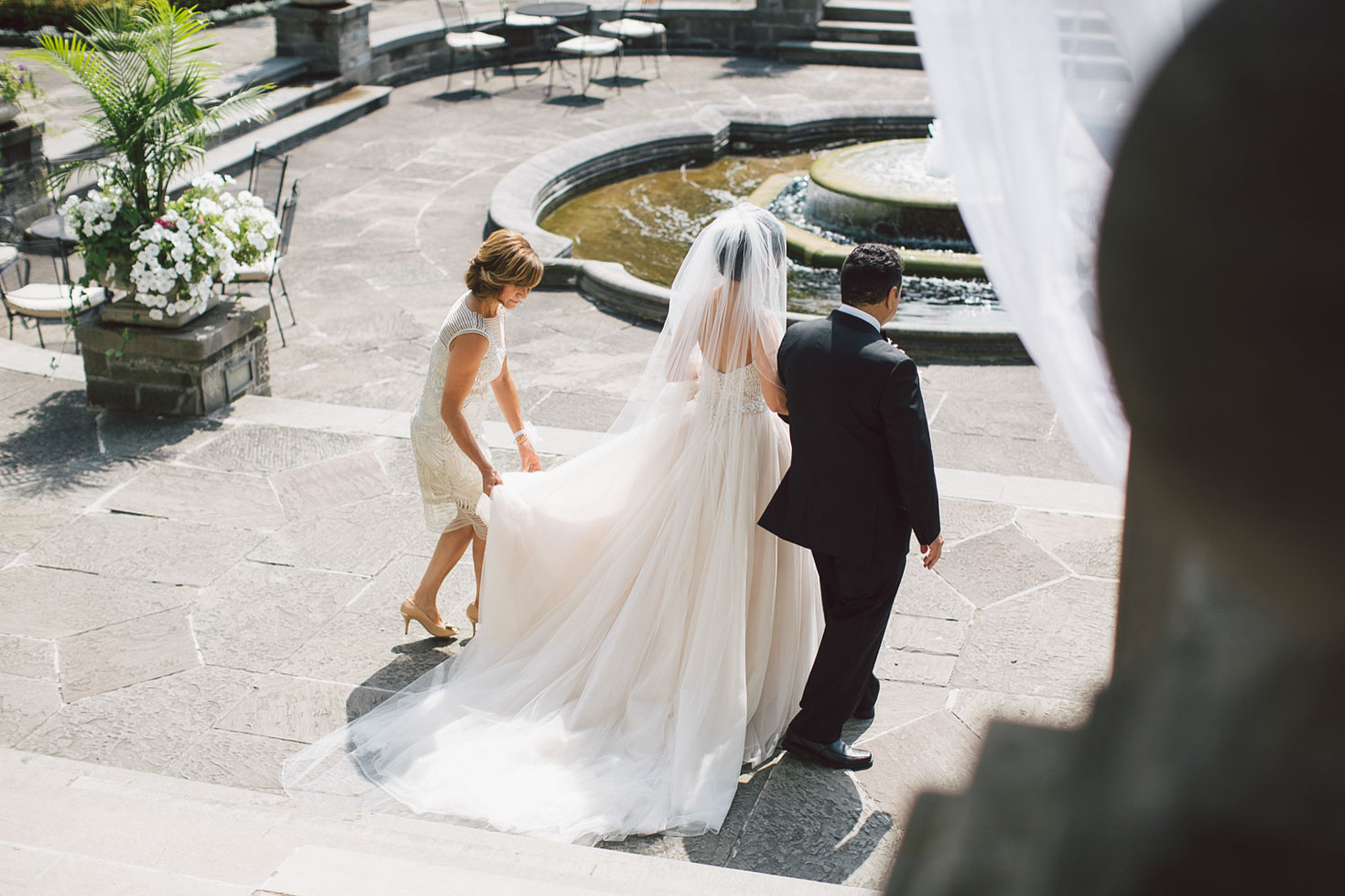 bride escorted down the aisle