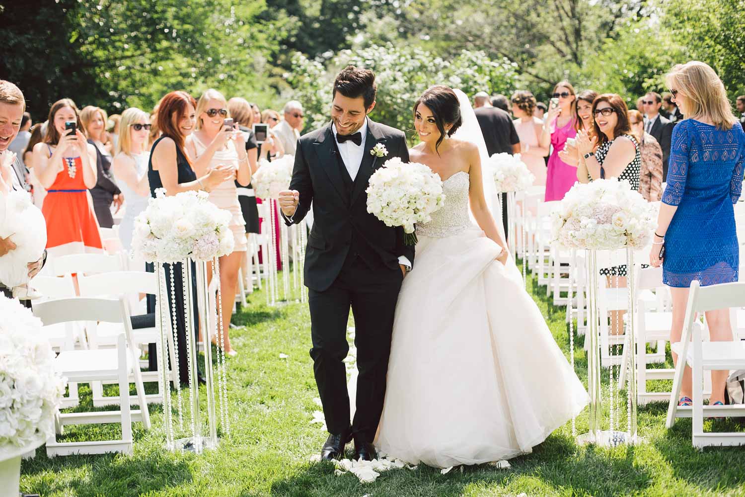 bride and groom walking off the ceremony