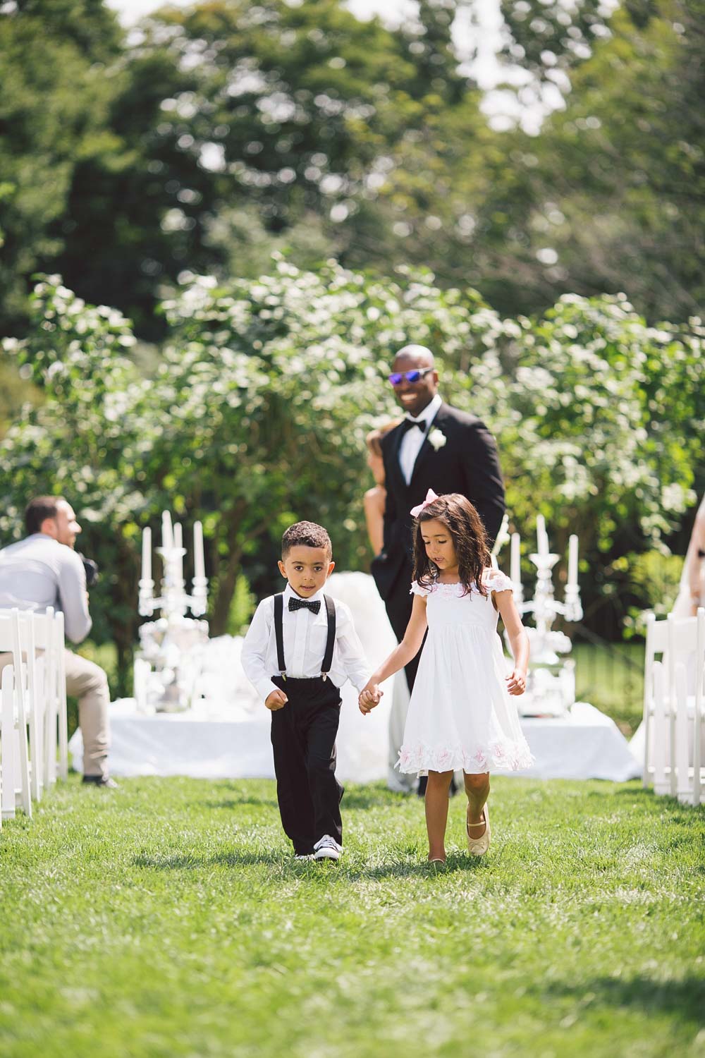 flower girl escorted by flower boy