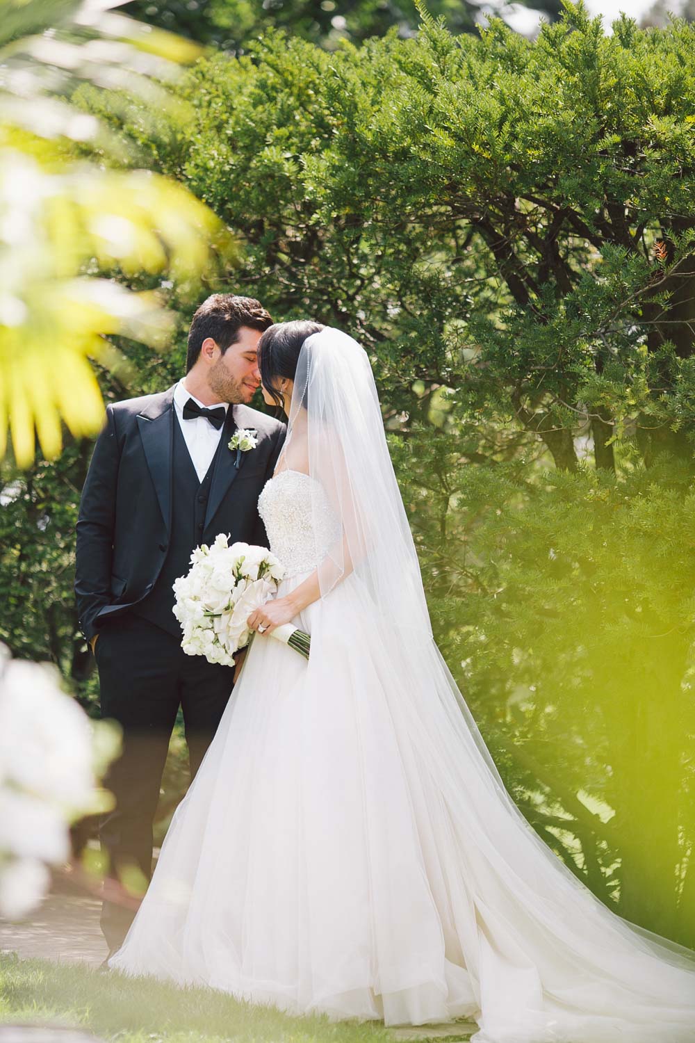 bride and groom posing at graydon hall
