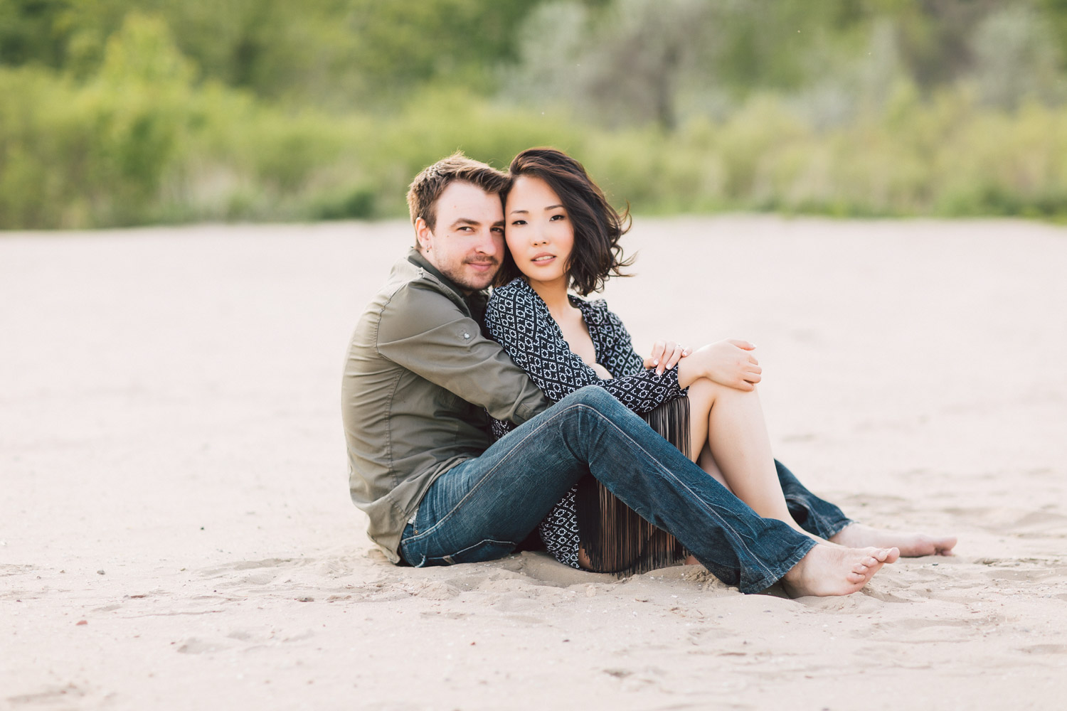 couple posing in the sand