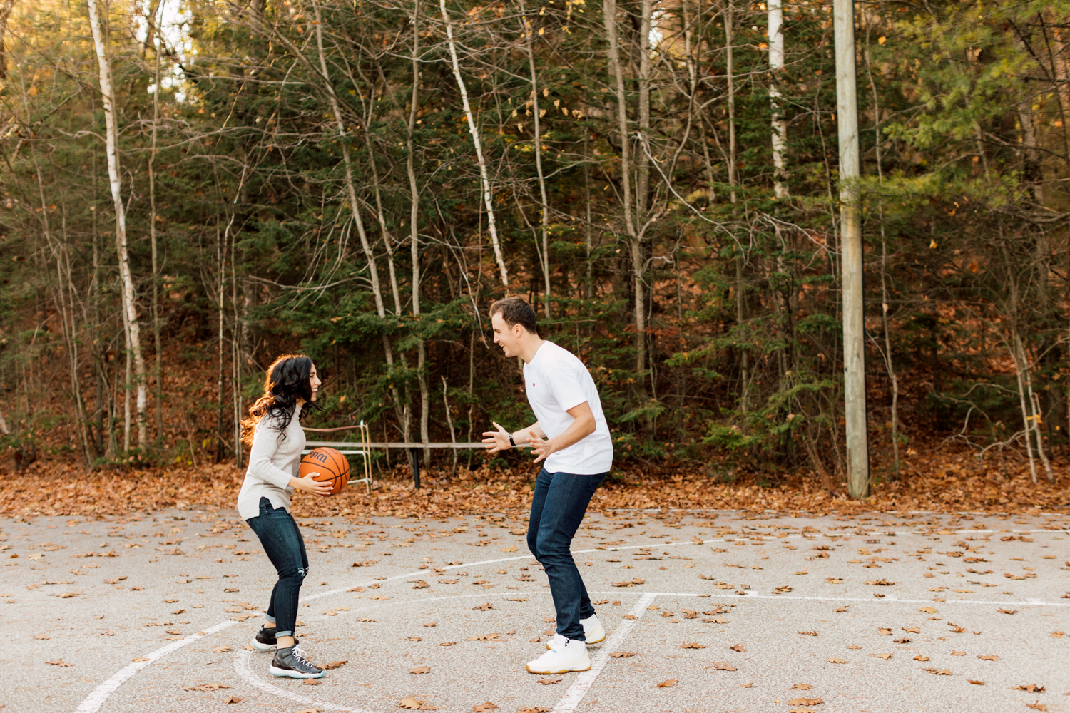 couple playing basketball