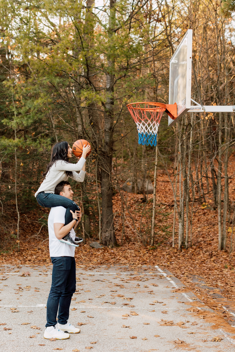 couple playing basketball