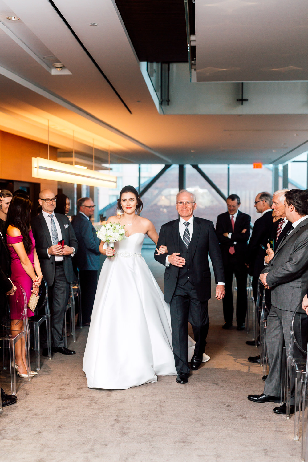 father and bride walk