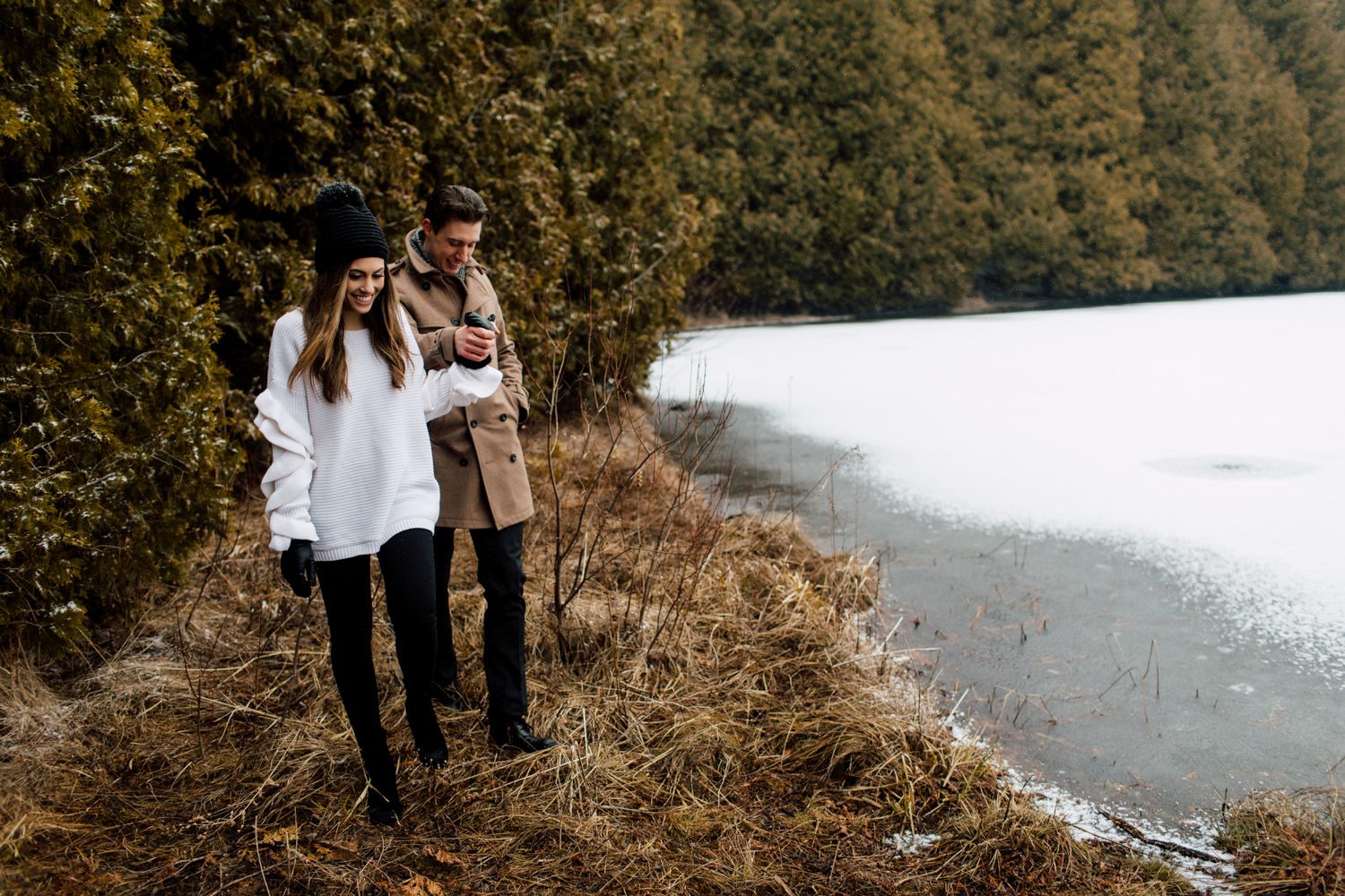 winter engagement by the lake
