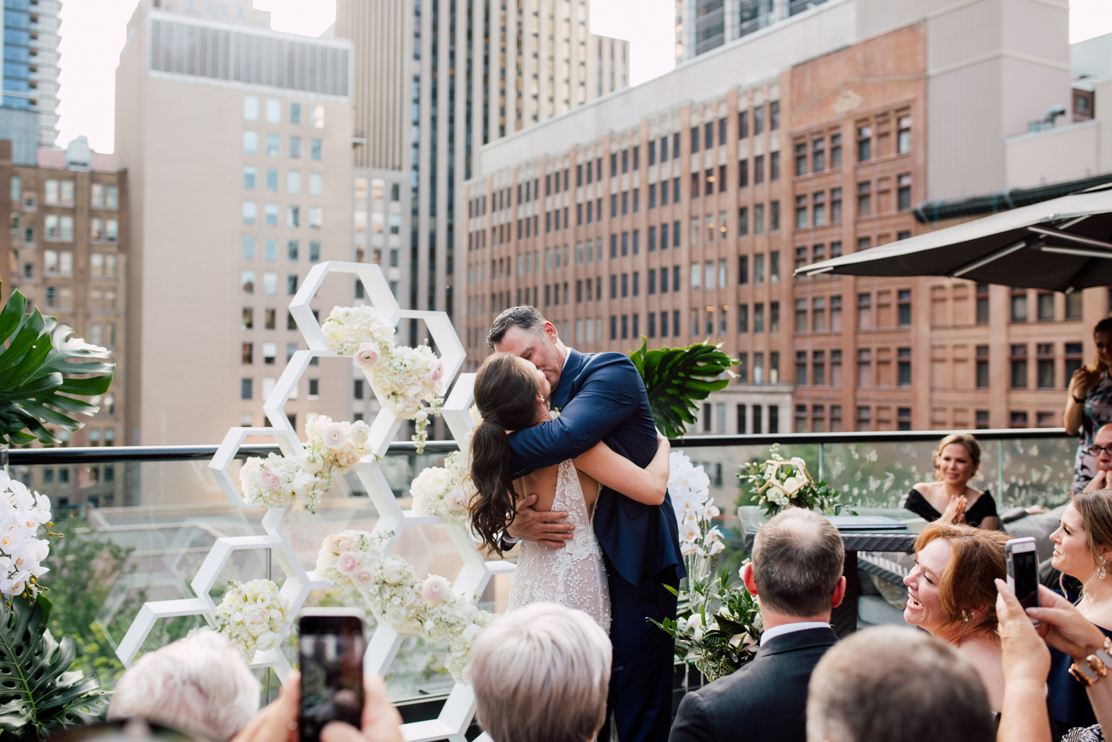 bride and groom first kiss