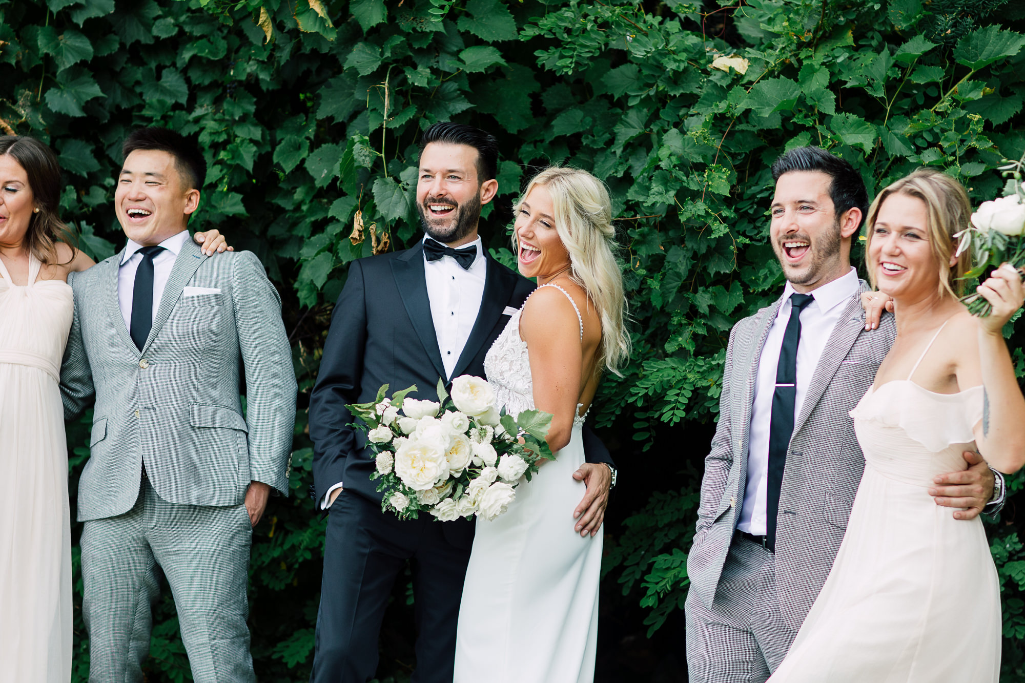 laughing bridal party