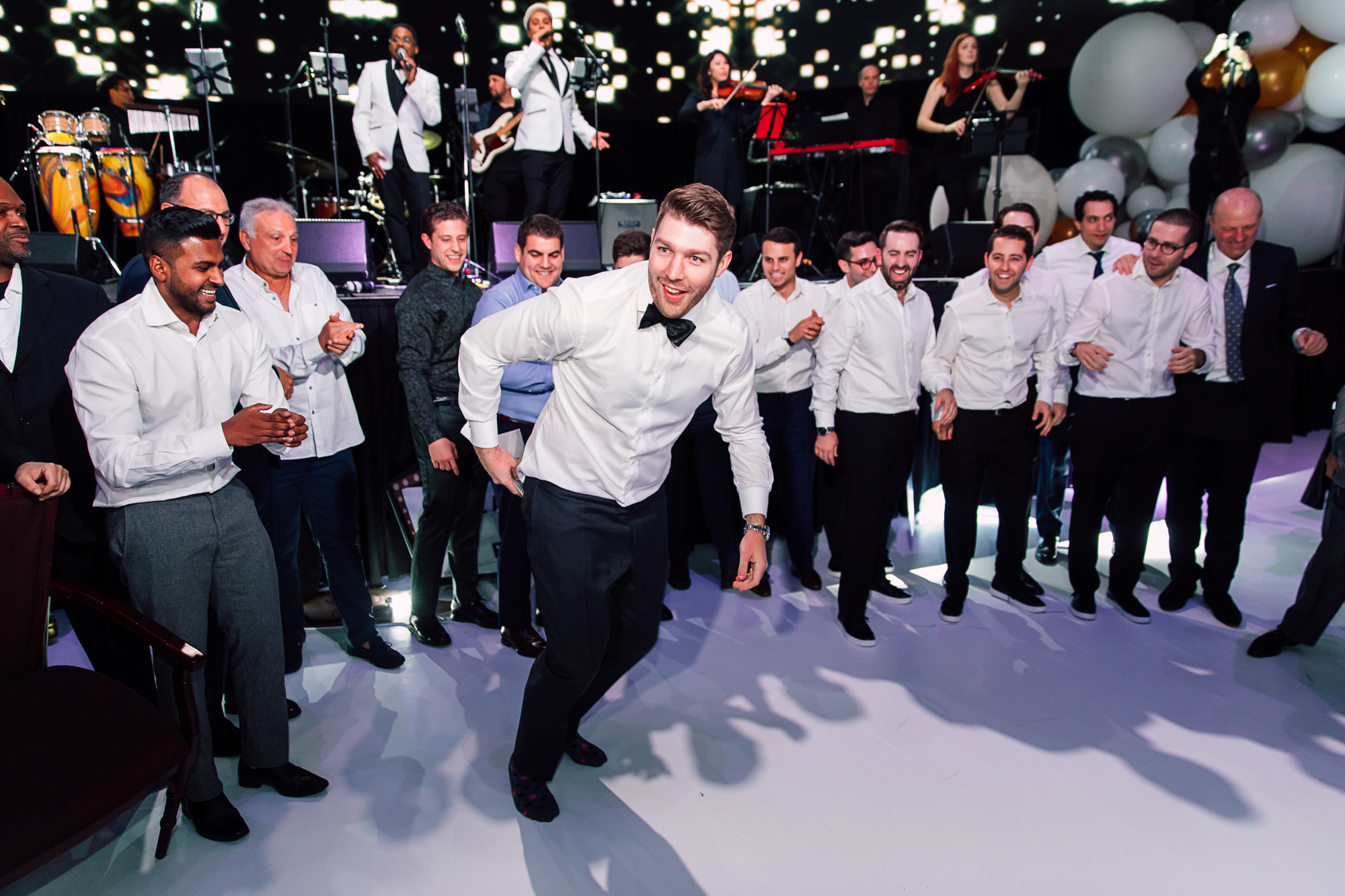 dancing groom reception