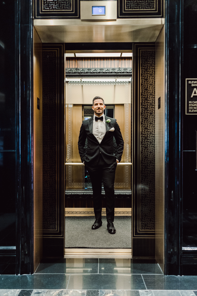 groom elevator portrait