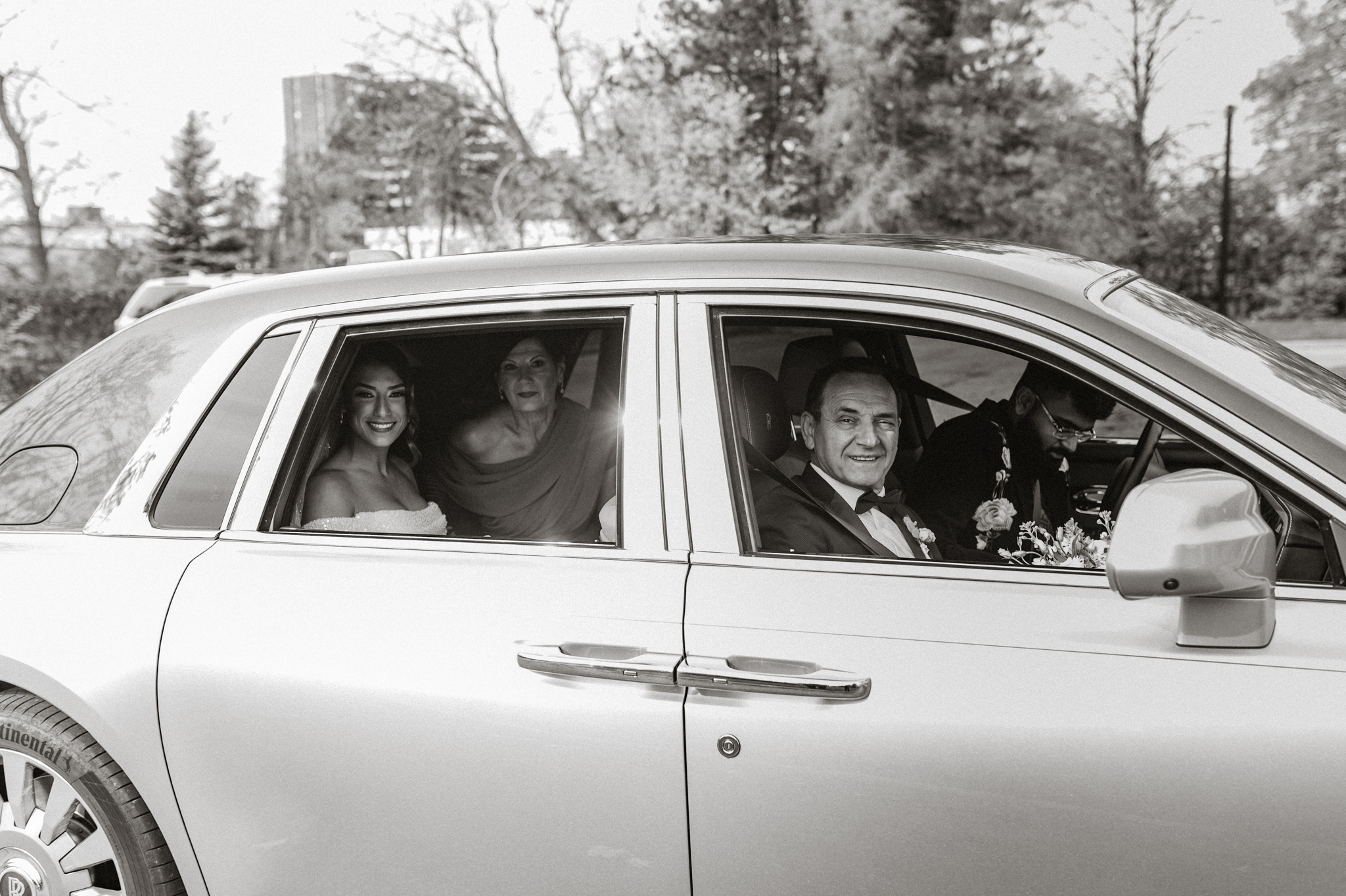 bride and family in car